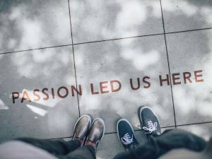 two person standing on gray tile paving